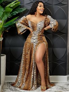 Повседневные платья Женщины с печо с плеча длинные рукава леопардовые высокие щели Макси африканские винтажные платья Большой размер сексуальные дамы ретро -коричневые