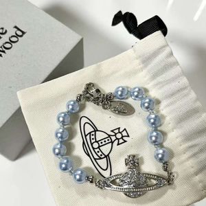 Viviene Westwoods Designer Jewelry Imperatriz Viúva Xis Nova Pulseira Blue Pearl Saturn com Design de Nicho Individualizado Versátil e Cheio de Diamantes Planeta Frisado