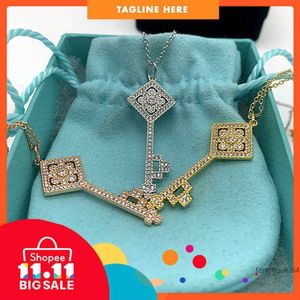 Moda Tasarımcı Tiff Ring Top T Ana Sayfa 925 STERLING Gümüş Anahtar Kolye Çok yönlü elmas KAPILI SAYFAÇI Çin Düğüm Kolye Basit Kazak Zinciri M74W