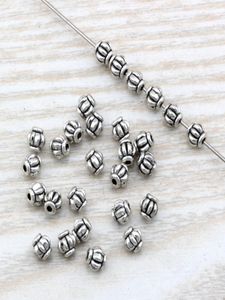 500pcs lotes antigos prateados liga de zinco Lanterna Spacer Riço 4mm para jóias Fazendo o colar de pulseira DIY Acessórios D294777292