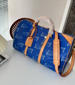 ny stil duffel axelväska 50 cm bagagepåsar toppnivå kvalitet kvinnor blå crossbody väska lyx tryck platt designer resväskor stor kapacitet handväska tote n40499