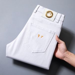 2023 nuovi jeans da uomo buco azzurro grigio scuro pantaloni da uomo di marca Pantaloni Street jeans attillati slim denim dritto di alta qualità Lettera in metallo v