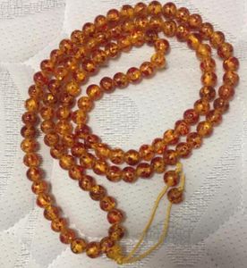 Collana all'ingrosso dei branelli di preghiera ambrati del Tibet delle catene