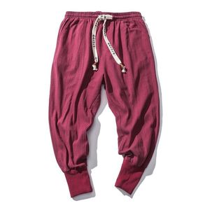 Calça masculina mola de rua de primavera masculina calça calça casual de linho de algodão, estilo coreano Homem calças de corredor calças folgadas 230404