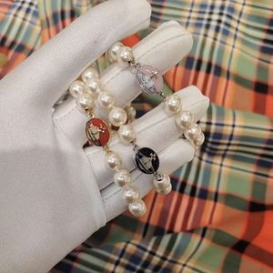 Viviane Collana Designer Viviennes Westwoods Gioielli Hip Hop di lusso Saturno smalto magnete fibbia braccialetto di perle femminile poco profumato luce di lusso