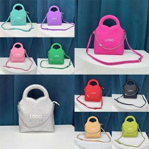 Дизайнерские сумки розовые тота женская 2023 Новая популярная буква сумки мода кросс -кусоч