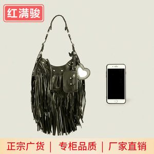 Double sided tassel shoulder bag for female niche, soft PU rivet underarm bag, fashionable and trendy crossbody bag 230406