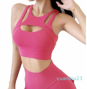 Yoga outfit Sexig kvinnors sportbh kvinnor tätt elastisk gym väst sport Bras BRALETTE CROP TOP HOLLOW OUT BROSS PAY avtagbar sportkläder