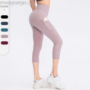 Designer Lululemenity Womens Yoga Autumn and Summer Sports High Waist Middle and Long Pants Nude Feel Double Sided Skincare Yoga Pocket Fitness Running Hip Lift Yoga