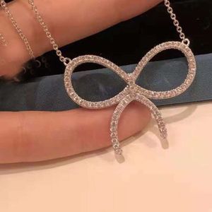 Ism koreansk version ny mikro inlagd diamantdesigner halsband t familj båge halsband kvinnlig sommar kassakedja sändning smycken tiff