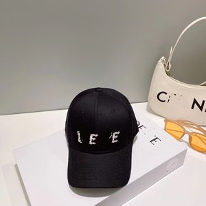 Mode loweing baseball cap canvas mens kvinnor lowe caps designer svart vit broderad bfemale lowe hatt sommar avslappnad hundra ta skydd justerbar solhatt