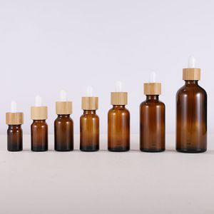 Stock Hot Sale Amber Dropper Liquid Bottle 5 -100ml With White Or Black Rubber Head Bamboo Ring