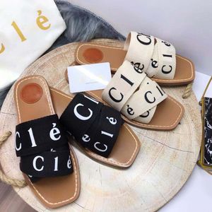 Fashionable designer sandals cork flat bottoms fashionable summer the most popular beach classic womens slippers