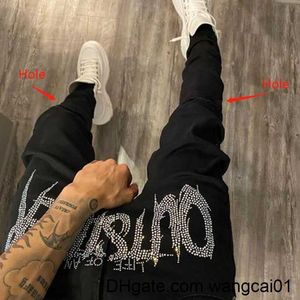 Men's Jeans New Men Stretch Destroyed Ho Taped Slim Fit Black Jeans Biker Trousers Ripped Skinny Hot Drill Street Punk Denim Pencil Pants 0408H23