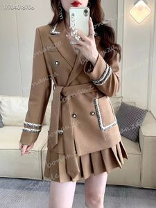 Spring and Autumn Fashion Trend Ribbon Edge Long sleeved Double breasted Lace up Waist Wrapped Suit Coat 100 Pleated Half Skirt Set