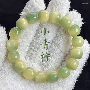 Collana di orecchini con corda di radice di Bodhi naturale con dito femminile di piantaggine verde attorno al braccialetto con piastra di perline Johor