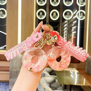 Oil glow-in-the-dark donut key chain cute liquid quicksand car pendant personality fashion bag accessories wholesale