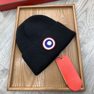 Populär presentdesigner hatt hatt beanie vinter beanie stickade kashmir bokstäver avslappnad utomhushuven stickade kepsar 20 färg mycket nic