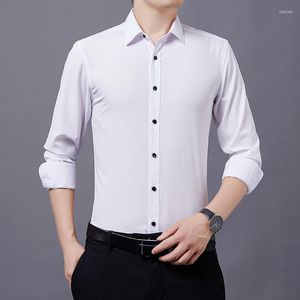 Herrklänningsskjortor 6xl Spring/Summer High Quality Large Size Men's Pure White Shirt Lång ärm Non Iron Fashion Thin Fit Business