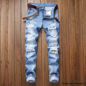 Мужские джинсы осень новая мужская одежда, разорванная прямая подгонка растяжки, джинсы мода синяя повседневная социальная вечеринка хип -хоп.