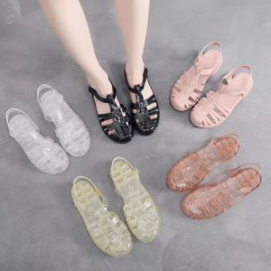 Frauen Sandalen Damen Pantoffeln Mode Luxurys Blumenschützer Leder Gummi Flats Sandalen Sommer Beachschuhe Slipper Ausrüstungsböden Schieberegler