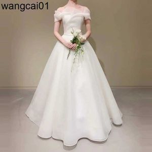 Parti Elbiseleri Yeni Tasarım Ivory Gelinlik OFUSUZ ZEMİN NGTH KISE KISE AVEVE ORGANZA A-LINE BACKSS Kore Gelinlikleri 0408H23