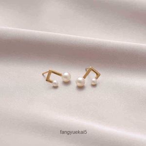 18 Karat goldene Tang-Kristall-T-Home-Perlen-Roségold-Ohrringe, natürliche Perlenohrringe, exquisiter Kunststil