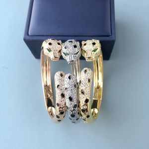 Designerkollektion Stil Öppna armband Armband Dam Dam Inställningar Diamantpläterad Guld Färg Svarta fläckar Gröna ögon Leopard Panther Modesmycken
