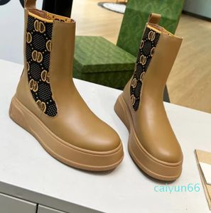 Bottines confortables pour femmes avec bottes à fond plat avec coutures en tissu élastique, semelles épaisses en cuir véritable, poignets à bout rond, bottes de mode décontractées