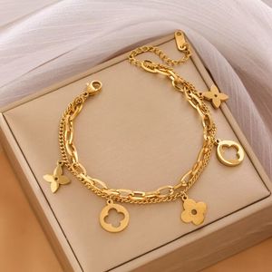 Klassiska dubbla armband designer lyxarmband colver fyra bladsmycken 18k guldpläterade kedjor metallblommor charm för festdress flickor chrismas semester gåva 5a