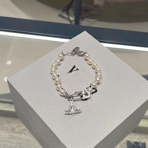 Beaded Vivi West Charm Armelets Designer Saturn hålade ut full diamantstift Pärlarmband för Mens Womens lyxiga smycken Orecchini Bijoux Cjewelers