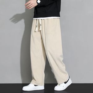 Spodnie towarowe Joggers Mężczyznki Spity High Street Spodnie dla mężczyzn Pełna długość Joggers Casual Sportsła Hip Hop Harem Spodnie Casual Doripstring Blend Pants M-4xl
