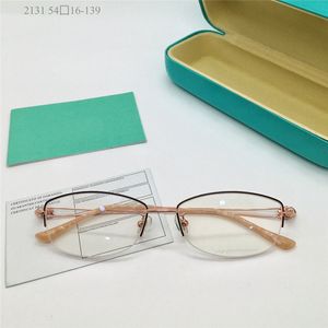 Occhiali da vista da donna di nuovo design alla moda 2131 mezza montatura in metallo di forma ovale piccola stile semplice ed elegante con lenti trasparenti occhiali di alta qualità