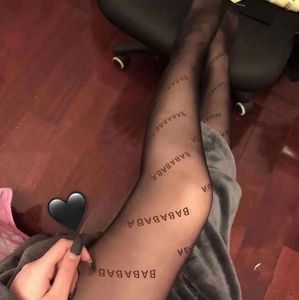 Designstrumpor för kvinnor bokstäver strumpor mode lyxiga andningsbara designers ben tights kvinnor sexig spets strumpor enhetlig storlek tryckt