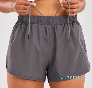 Pantaloni della tuta da yoga pantaloni da yoga in rete finti in due pezzi Pantaloncini sportivi americani da donna anti-esposizione ad asciugatura rapida possono essere indossati all'esterno