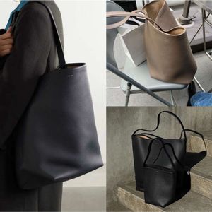 Designer die Reihe Eimer Bags Cowide Damenbeutel Litchi Muster Junior High -Kapazität mit großer Kapazität mit einem Schulterschaufelbeutel