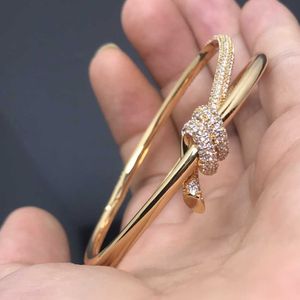 Marchio originale TFF Bracciale Knot Nuovo prodotto con Diamond Gold Fashion Design Advanced Personality Farfly Rope avvolto con logo 8j6m