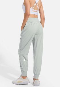 Kvinnor byxor capris ll kvinnor jogga yoga nionde fickfitness leggings mjuk hög midja höftlyft elastiska casual dragstring ben tröja med midja sweatpants