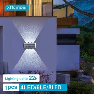 Luzes de parede solar luminária de parede solar externo 8LED quente IP65 impermeabilizada para cima e para baixo Decoração de iluminação luminosa Jardim da varanda do quintal Q231109