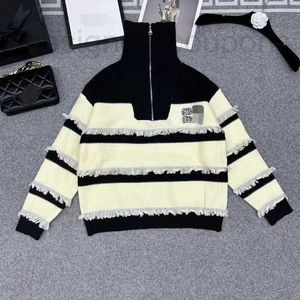 Kobiety Sweters Designer Luksusowy Mi Miao Family Letter Wiertło paznokci 23ss Autumn/Winter Nowy wysoki szyja Pół zamek błyskawiczny Tassel Knit E2of