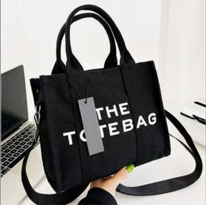 Марка 2023. Сумка MJ the Tote. Дизайнерская сумка через плечо. Черная практичная классическая вместительная сумка для монет. Сумка через плечо.