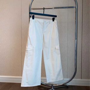 Lüks Tasarımcının Yeni Erkek ve Kadınlar Kısa Kollu Spor Giyim Seti Gömlek 2023 Erken Beyaz Yeni Beyaz Tatlı Serin Gevşek Düz Tüp İş Giyim Pantolon Kadınlar İçin