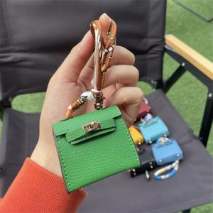 Lyxig nyckelpåse handväska krok headsetväska hängande tillbehör mini satchel koppling väska barnväska