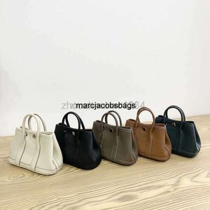 garden party Bag luxurys handbag handbags garden party Cowhide lychee pattern mini cowhide hand 2022 new summer messenger