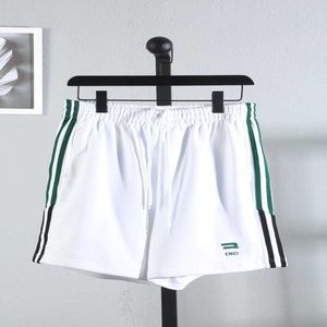 レディースデザイナーTシャツハイバージョンファミリースタイル両側に緑の白い垂直文字が刺繍された衛生パンツカジュアルショーツ男性女性