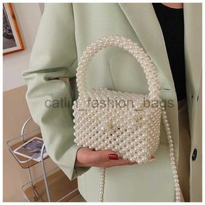 Bolsas de ombro Bolsa balde larga de pérola-doce feita de mãos puras para telefone férias praia trem modecatlin_fashion_bags