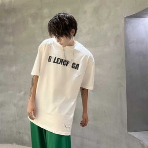 高級デザイナー女性Tシャツハイバージョン2023夏の家族壊れた穴バーストレターネットレッド同じスリーブTシャツ