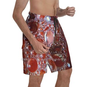 fabletics mens shorts for Men - In Depth Beach Circles in Orange, Peach, and Clear Sizes