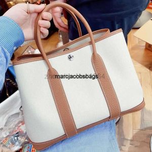 Gartenparty -Tasche Luxurys Handtasche Handtaschen Gartenparty 2022 Neue Damen Single Diagonal Span Tasche Tasche Vielseitige Leinwand tragbarer Einkaufsschaufel