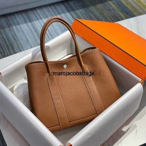 Bolsa de festas de jardim Luxurys bolsas Bolsa Festa de jardim Couro feito à mão para mulheres 2022 Novo lazer de grande capacidade balde de bolsa portátil de portátil